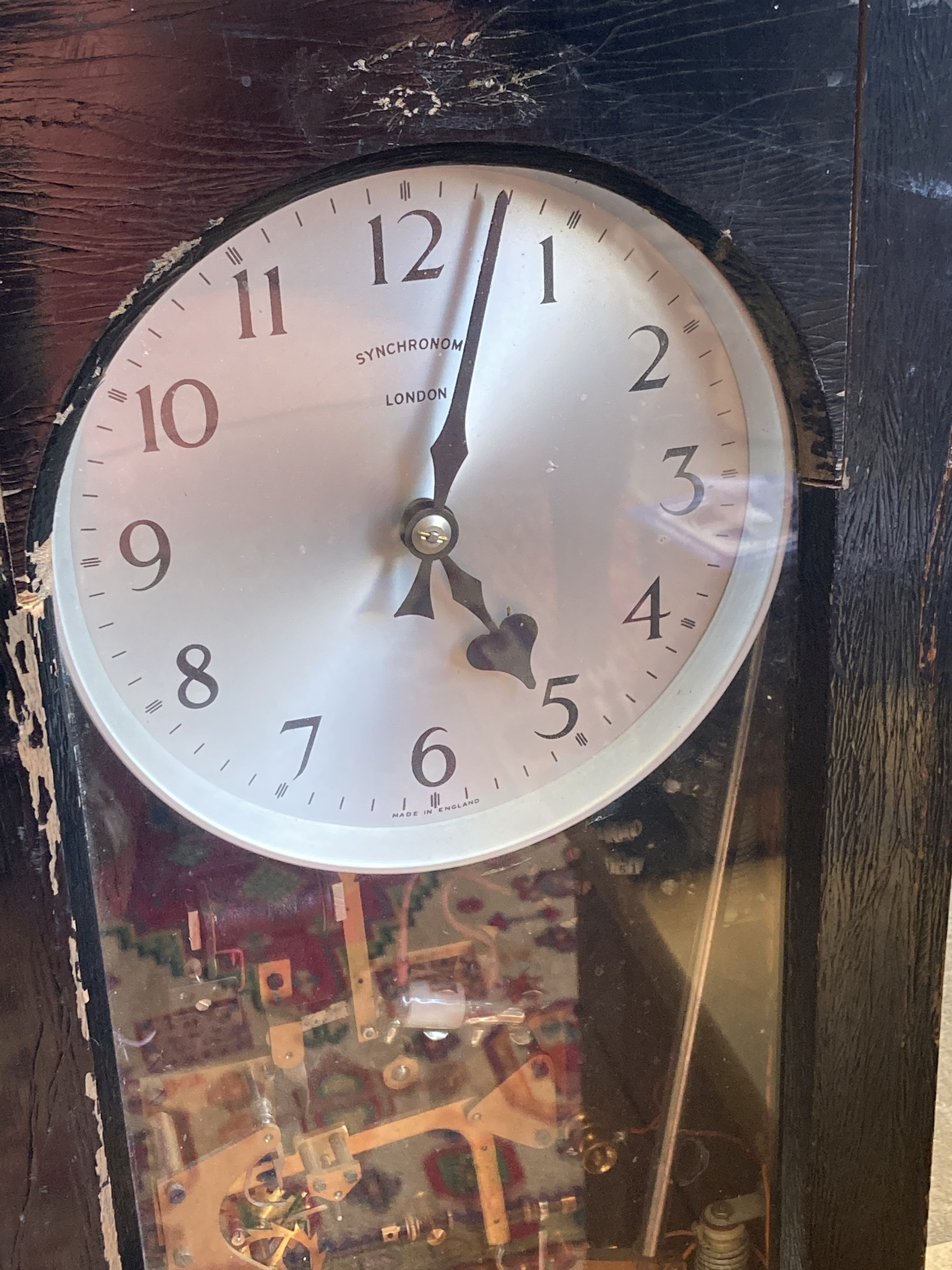 A Synchronome electric pendulum master clock, in an ebonised case, NRA 318, height 126cm